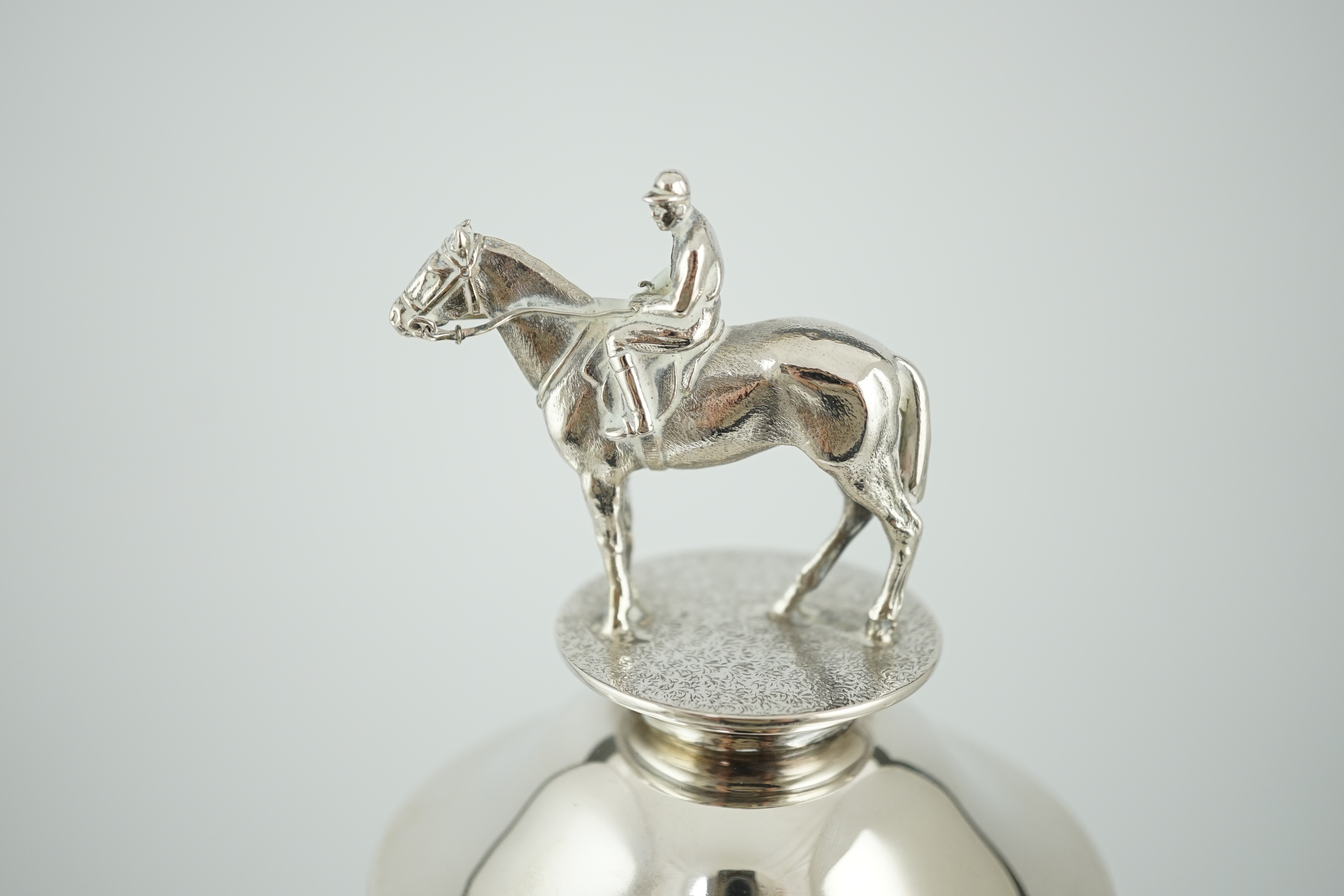 A large George V silver two handled horse racing presentation cup and cover by Edward Barnard & Sons Ltd